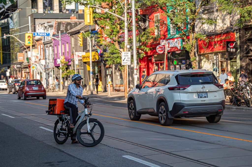Man cycling in Toronto